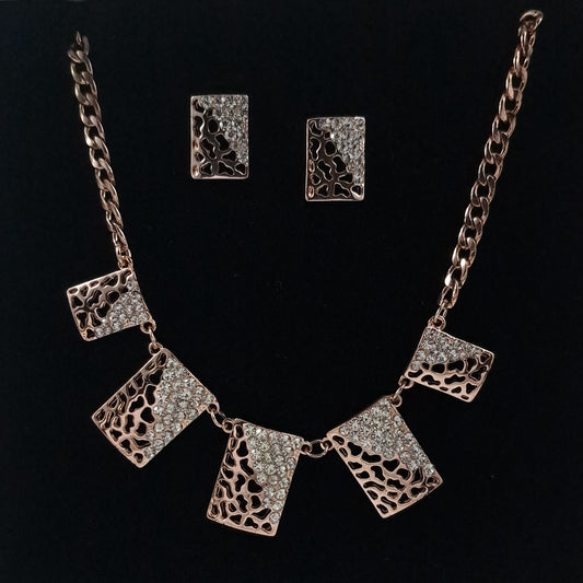 Gold and diamante necklace and earrings set